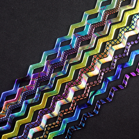 Patterns Galore Dichroic on 6 mm Black Firestrip 90 COE 16 in. long link